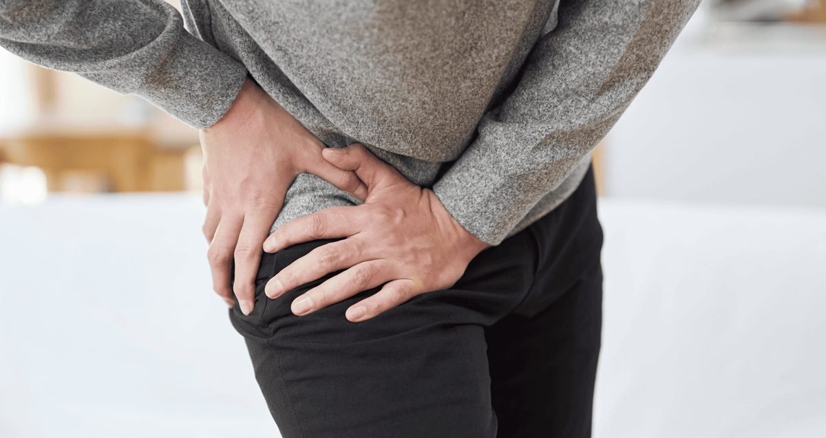 Hip Bursitis vs. Hip Arthritis: How a Delray Beach Orthopedist Tells Them Apart Orthopedist examining a patient's hip to distinguish hip bursitis from hip arthritis in Delray Beach